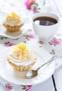 Tart with whipped cream and a cup of tea on the table Royalty Free Stock Photo