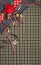 Tartan background texture with polka dots and red ribbon