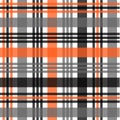 Tartan pattern,Scottish traditional fabric, orange and black tone background.