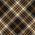 Tartan plaid pattern background. Seamless diagonal check plaid graphic in black and gold. Royalty Free Stock Photo