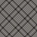 Tartan plaid pattern texture in black and white. Seamless dark woven twill check background for scarf, dress, blanket, throw.