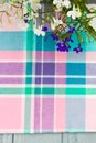 Tartan square pattern with blooming lobelia flowers Royalty Free Stock Photo