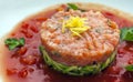 Tartar beefsteak with fresh cucumbers and tomato sauce