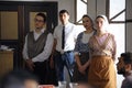 At the Tartar restaurant: male and female cooks standing, waiters waiting beside