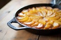 tarte tatin in a cast iron skillet fresh out of the oven