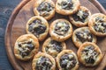 Tartelettes with shiitake mushrooms and cheese Royalty Free Stock Photo