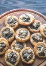 Tartelettes with shiitake mushrooms and cheese Royalty Free Stock Photo