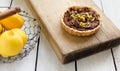 Tartlet with chocolate cream and lemon in a basket Royalty Free Stock Photo