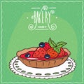 Tartlet with fresh strawberries on lacy napkin