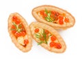 Tartlet with red caviar butter and dill on white background