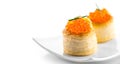 Tartlet with red caviar close up. Gourmet food closeup, appetizer. Close-up salmon caviar. Delicatessen Royalty Free Stock Photo
