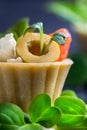 Tartlet with salmon and curd cheese with micro-green on a dark background. Royalty Free Stock Photo