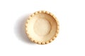 Tartlet shell isolated on white background, top view. Single empty mini tart shell for portable desserts