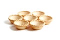 Tartlet shells isolated on white background. Empty mini tart shells for portable desserts Royalty Free Stock Photo