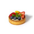 Tartlet with whipped cream and berries on white background. Candy bar, sweets and dessert, selective focus