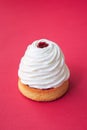 Tartlet with whipped cream and cherry jam over the red Royalty Free Stock Photo