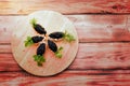 Tartlets with black caviar