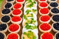 Tartlets with caviar, eggs and onion.