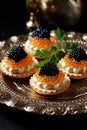 Tartlets with caviar on a plate. Selective focus.