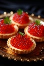 Tartlets with caviar on a plate. Selective focus.