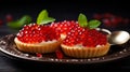 Tartlets with caviar on a plate. Selective focus.