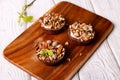 Tartlets with chocolate filling, cereal, nuts and mint Royalty Free Stock Photo
