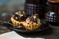 Tartlets with chocolate filling sprinkled with almonds Royalty Free Stock Photo