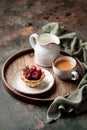 Tartlets with chocolate ganache and raspberries