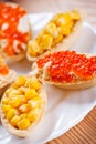 Tartlets with crab salad and corn