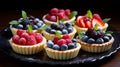 Tartlets with different berries. Selective focus.
