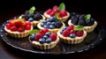 Tartlets with different berries. Selective focus.