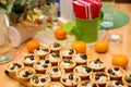 Tartlets filled with pate and garnished with olives