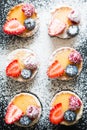 Tartlets of fresh berries and icing sugar Royalty Free Stock Photo