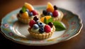 Tartlets with fruit and cream on a plate. Selective focus. Royalty Free Stock Photo