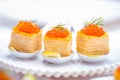 Tartlets with red caviar