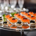 Tartlets with red caviar and black caviar close up. Gourmet food, delicacy appetizer. Delicatessen. Texture of caviar. Seafood and Royalty Free Stock Photo