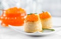 Tartlets with red caviar close up. Gourmet food close up, appetizer. Close-up salmon caviar. Delicatessen