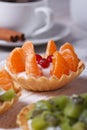 Tartlets with tangerine, cranberry and coffee