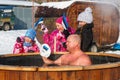 Man sitting in the hot tub after winter swimming