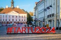 Tartu, Estonia - October 21, 2023: Town hall square is main square in Tartu, Estonia. Logo of European Capital of