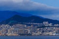 Tarumi, Japan - January 16, 2023: Large Apartment Complexes in Sprawling Coastal City by Mountains