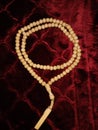 prayer beads on the sajadah