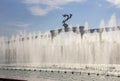 Fountains in front of the Ezgulik Arch on the Independence Square of Uzbekistan. Fountains on a sunny day