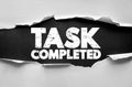 Task Completed text in distressed bold typography inside torn paper frame. Motivational and success concept for achievement, Royalty Free Stock Photo