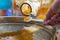 Taste of fresh honey - closeup