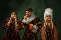 Medieval young man and women in old-fashioned costume