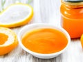 Sunshine in a Jar: Scrumptious Orange Jam Showcased on a Vibrant Table Display Royalty Free Stock Photo