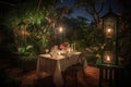 tasteful al fresco dining experience with blooming garden, starry night sky and candlelight Royalty Free Stock Photo