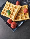 Tasteful waffles and dried strawberries for breakfast