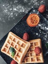 Tasteful waffles and dried strawberries for breakfast